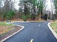 Park benches set back from trail