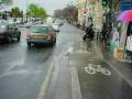 Motorcyclist crosses bike lane