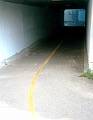 Skid marks at tunnel entrance